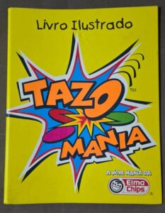 Livro Ilustrado Tazo Mania, um álbum/fichário lançado pela Elma Chips em 1997 para colecionar a primeira série de Tazos no Brasil.